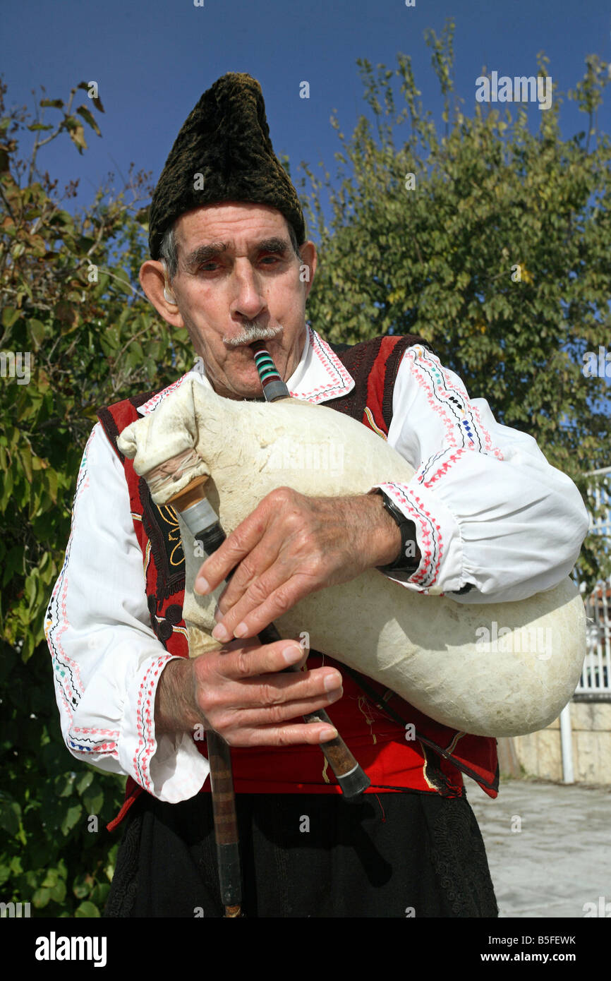 An old man playing bagpipes, Nesebar, Bulgaria Stock Photo