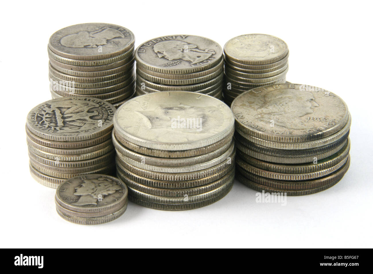 Stacks of old United States silver coins pre-1964. Stock Photo