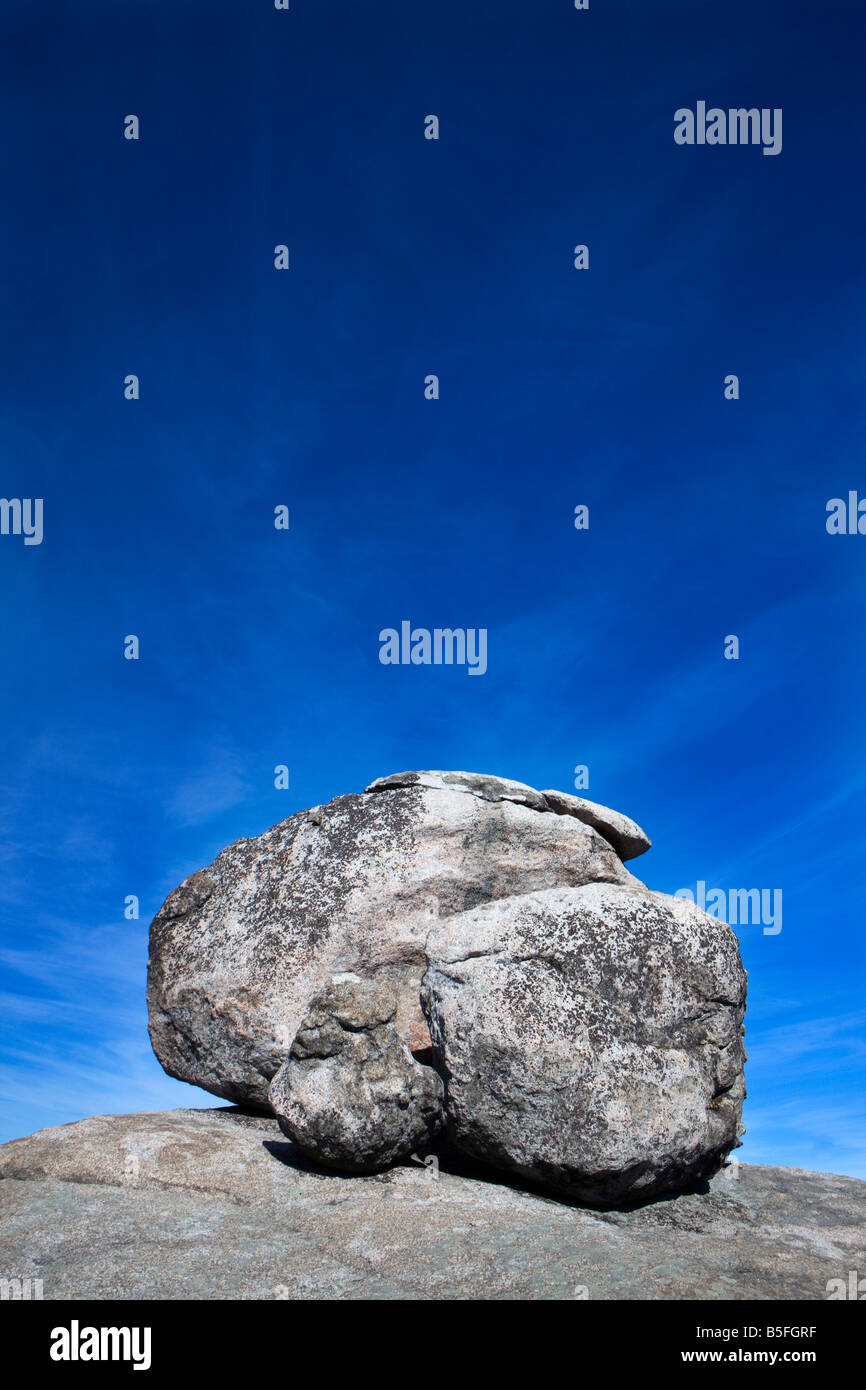 A large granite boulder sits on along the path up Old Rag Mountain, Shenandoah National Park, Virginia. Stock Photo