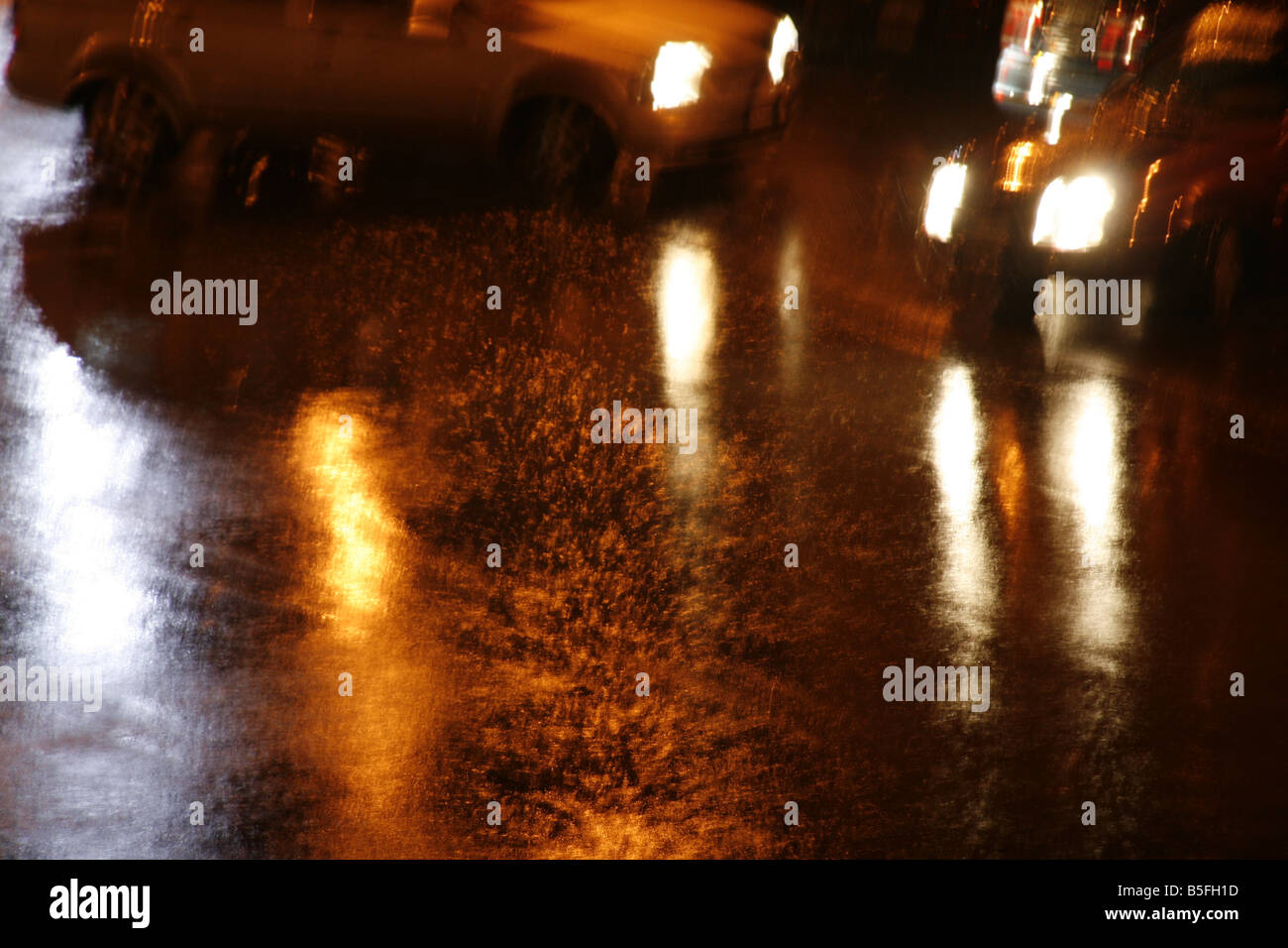 fast car driving in heavy rain at night in town Stock Photo Alamy