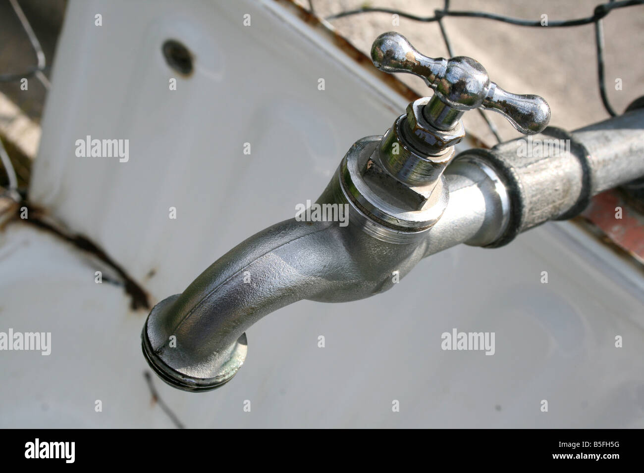 Outside water tap hi-res stock photography and images - Alamy