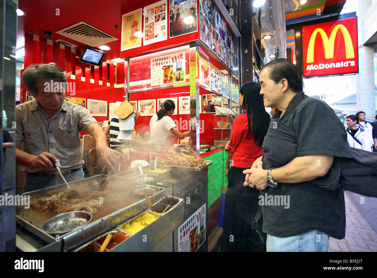 A street bar with traditional Chinese food in Hong Kong, China Stock Photo