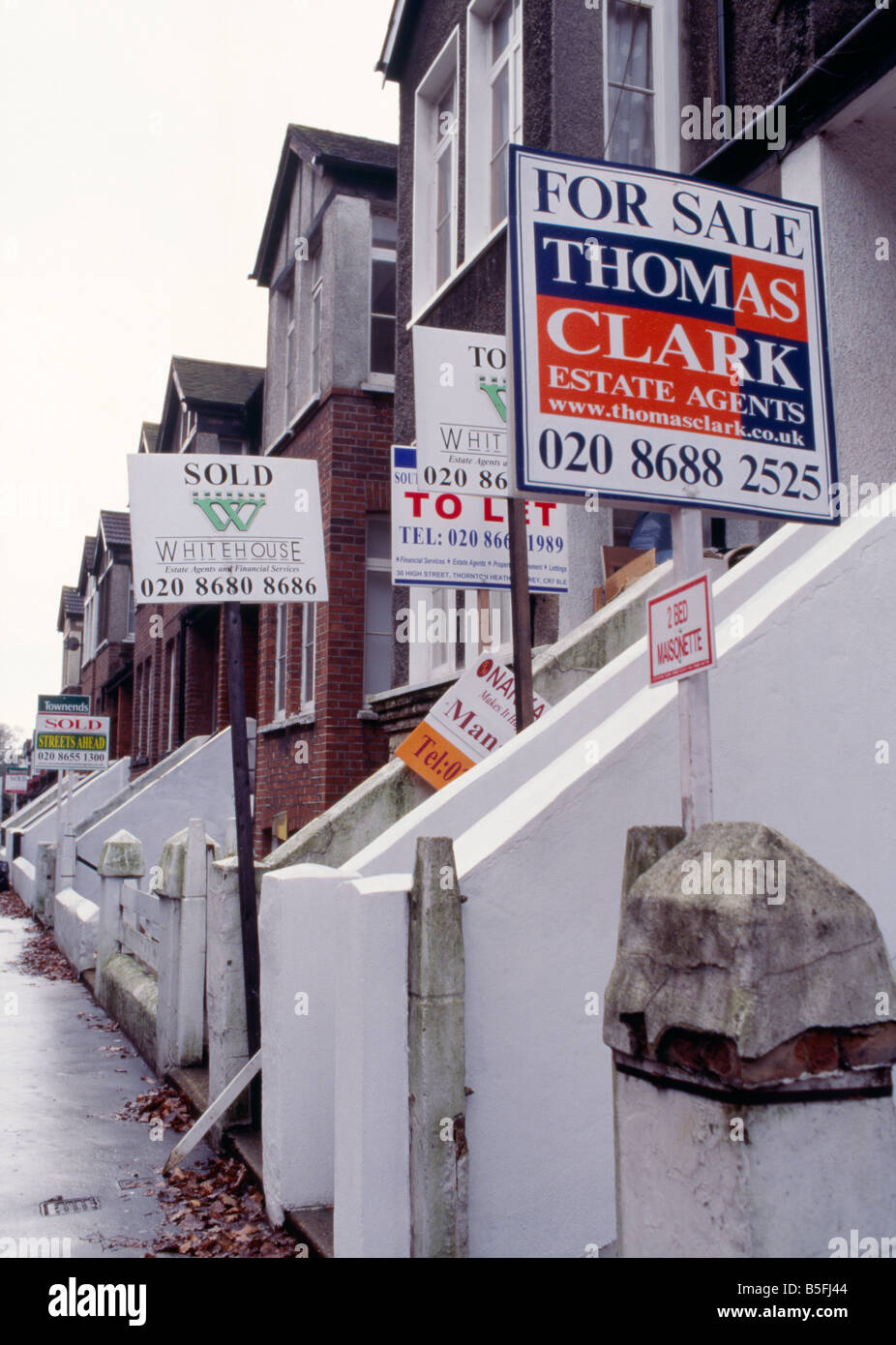 houses go on sale during market crash Stock Photo