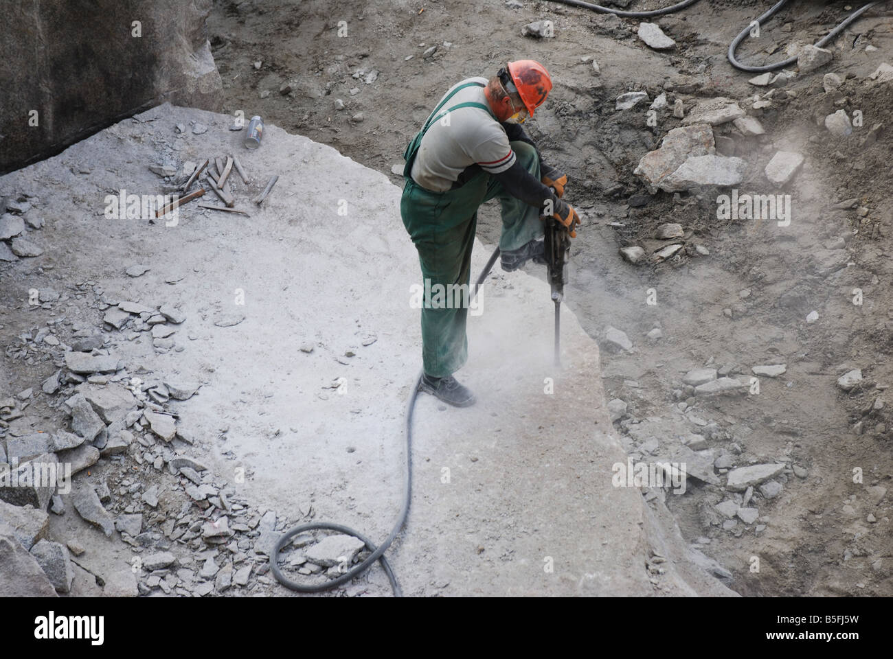 worker,concreting, flooring, laying, pouring, wet works, cement, covering, insulation, construction, business, company, services, height Stock Photo