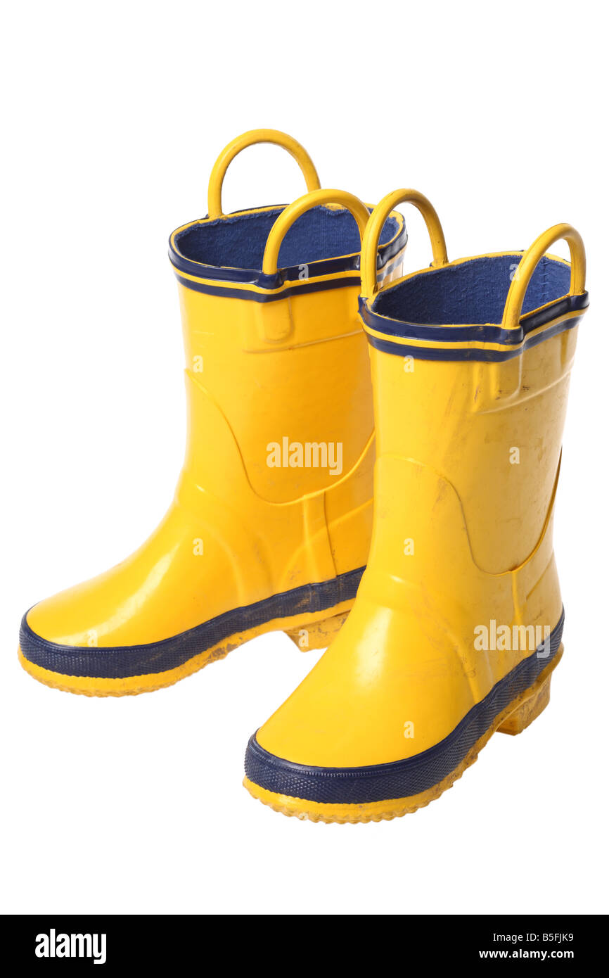 Yellow rubber boots cutout on white background Stock Photo