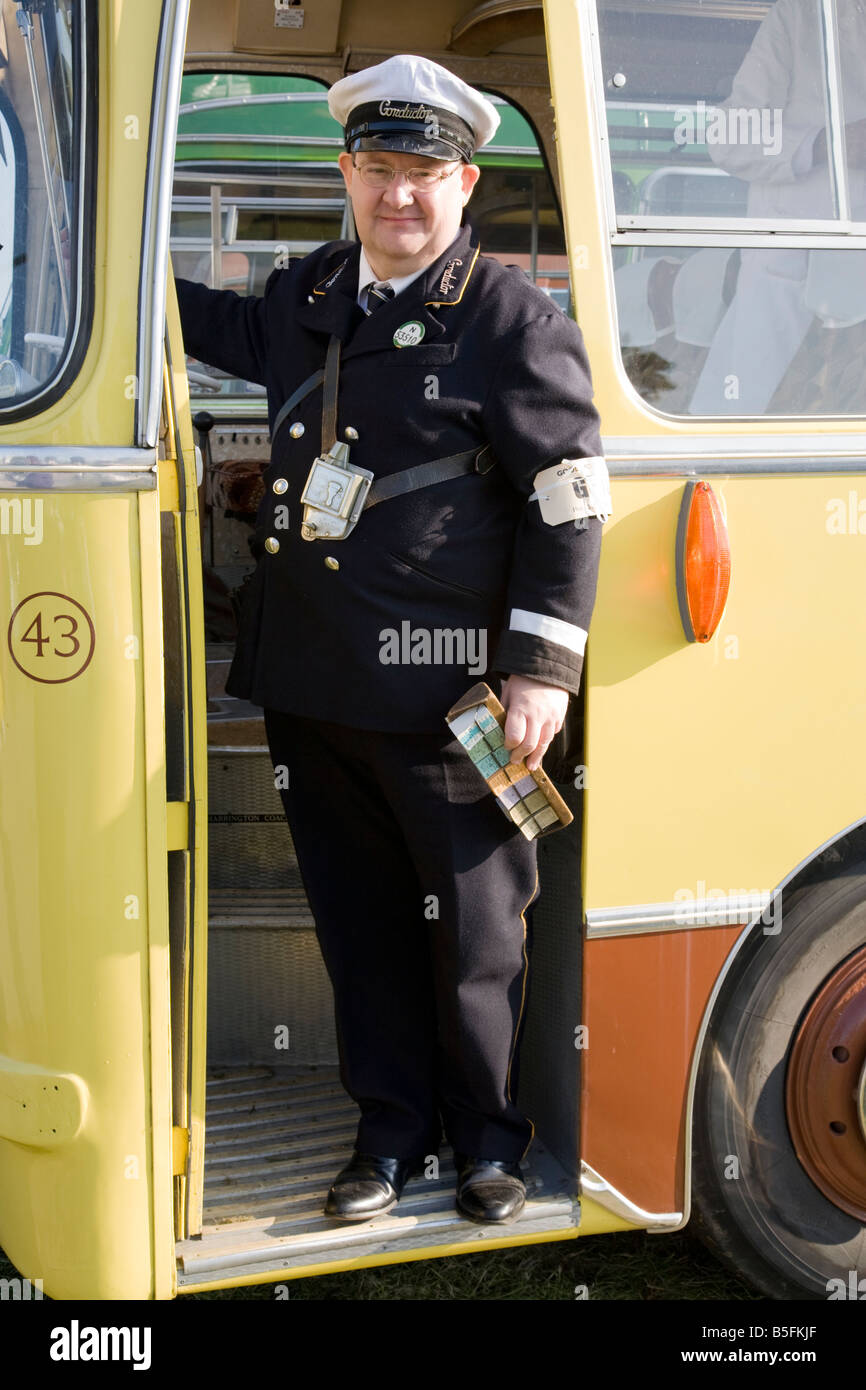 Bus driver fancy dress Goodwood revival Stock Photo