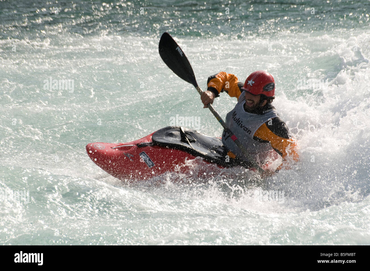 Competitor in whitewater kayaking competition Stock Photo Alamy