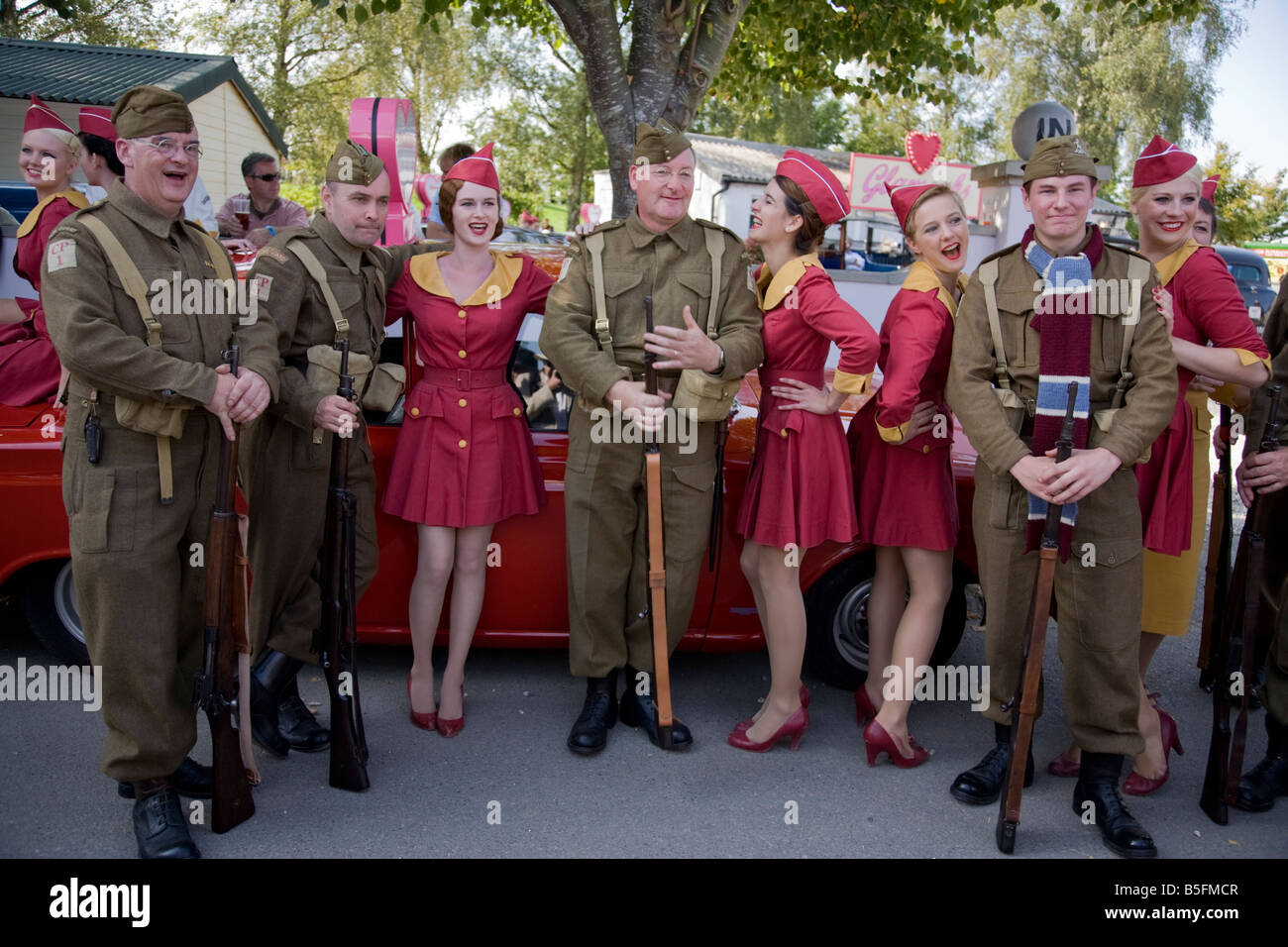 Goodwood Revival fancy dress Dads Army and Glam Cabs Stock Photo