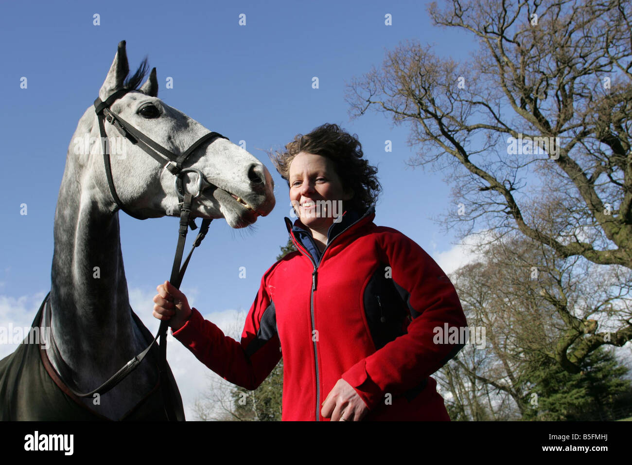 Racehorse Trainer Lucinda Russell with Horse Strong Resolve at their stables near Milnathort in Kinross  Stock Photo