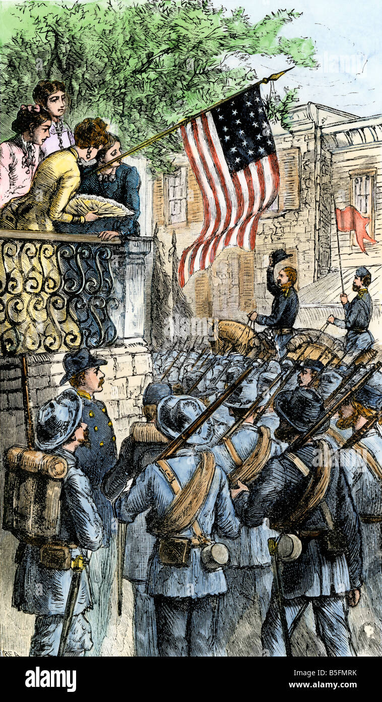 Northern family watching Union soldiers marching off to fight the Civil War. Hand-colored woodcut Stock Photo