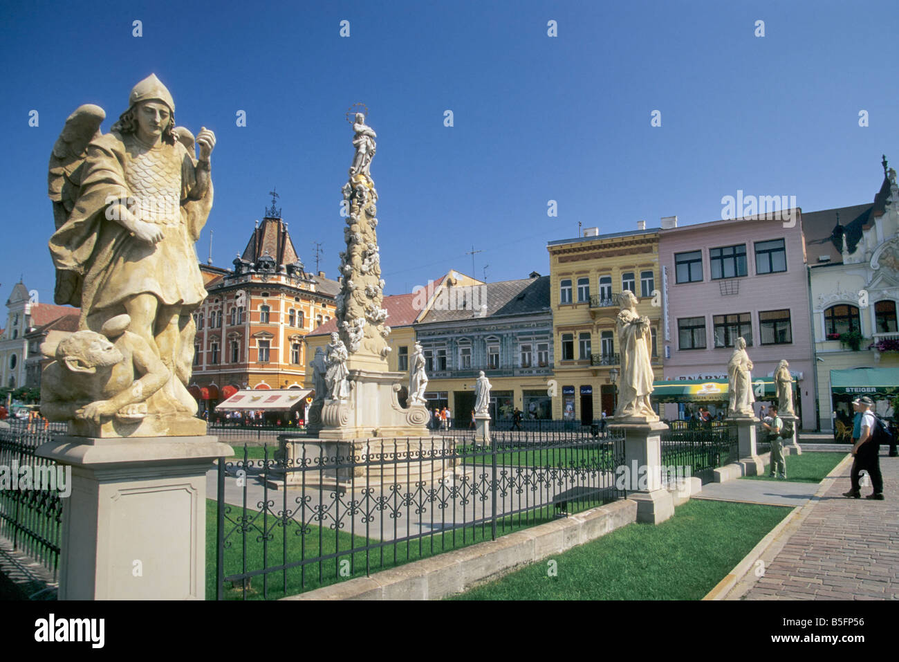 Angel statue near Plague Column and statue of saint at Hlavna Main Street in Kosice Slovakia Stock Photo