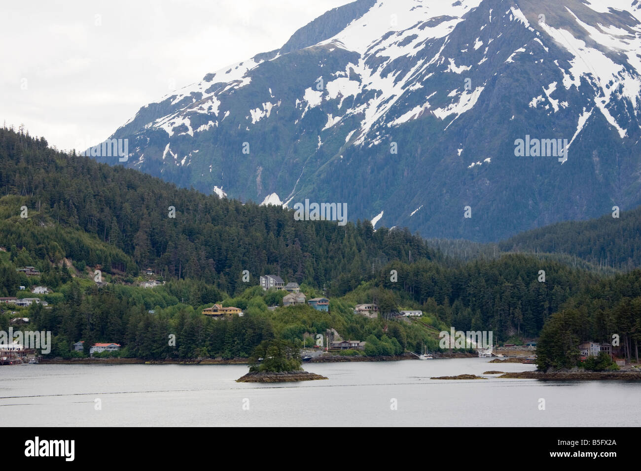 Private homes on rocky coastline of the Eastern Channel near Sitka, Alaska Stock Photo