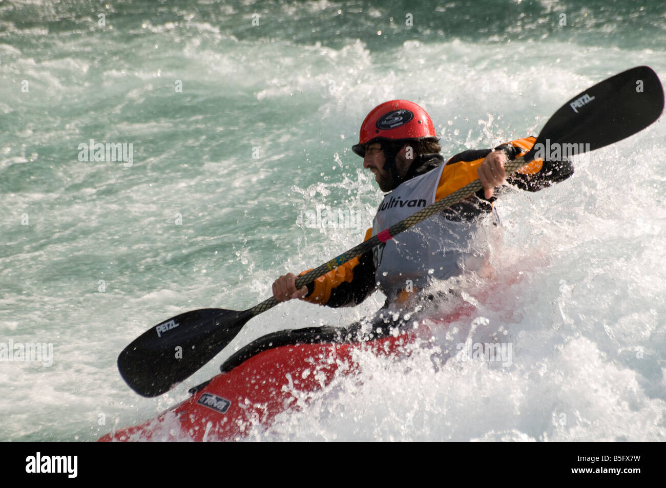 Competitor in whitewater kayaking competition Stock Photo Alamy