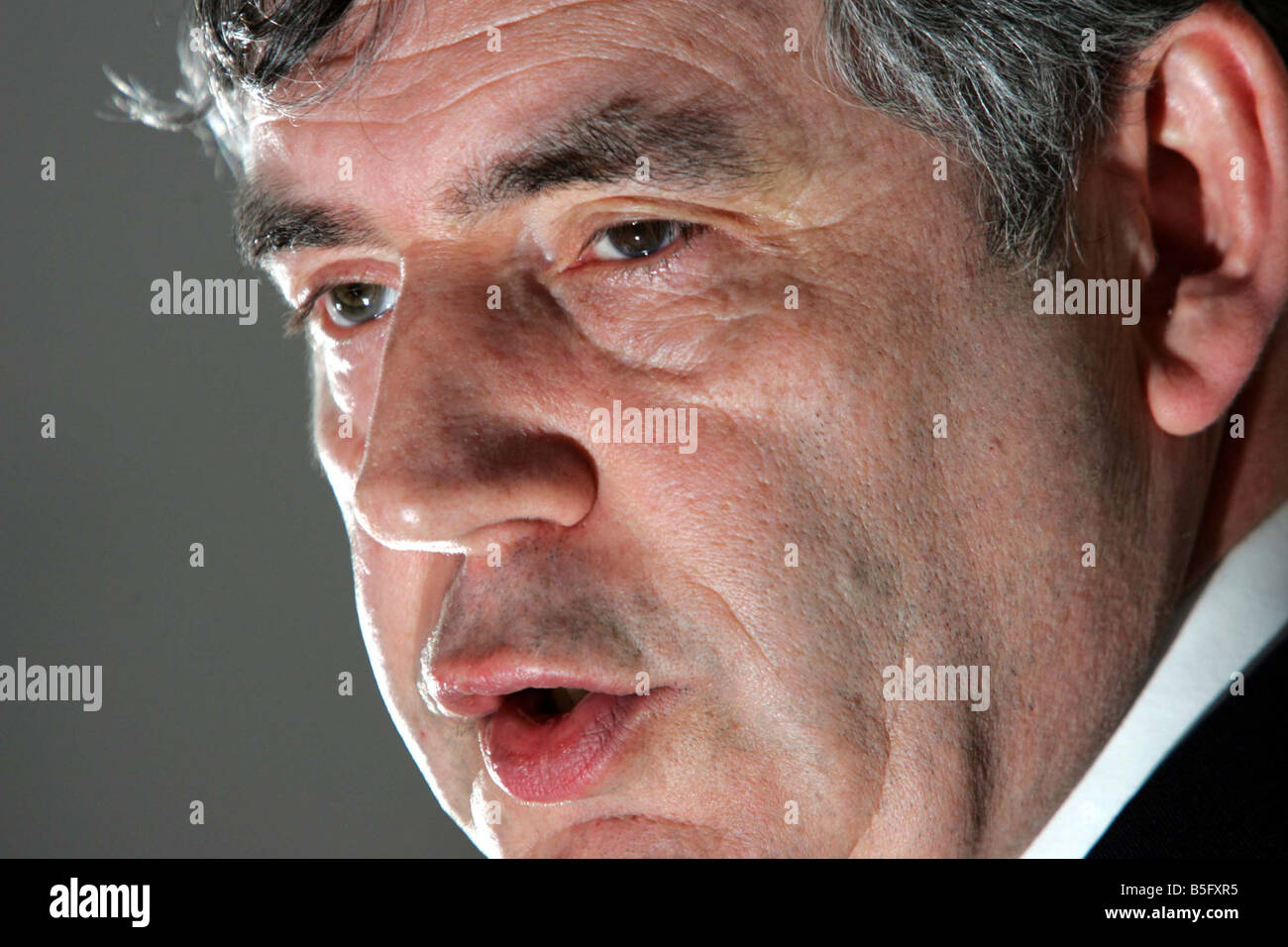 A portrait of Chancellor Gordon Brown speaking at the Scotland Office