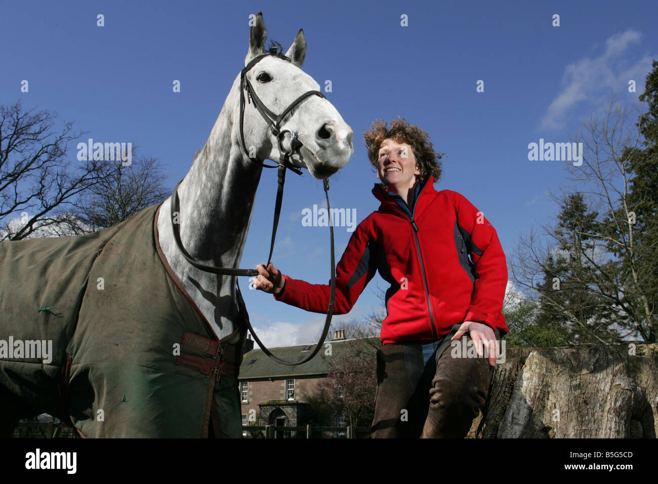 Racehorse Trainer Lucinda Russell with Horse Strong Resolve at their