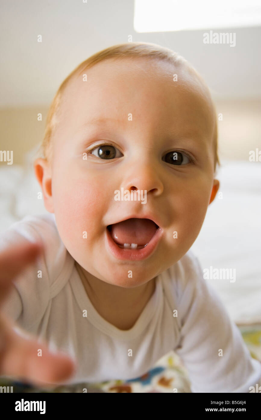 A 10 month old baby with mouth open Stock Photo
