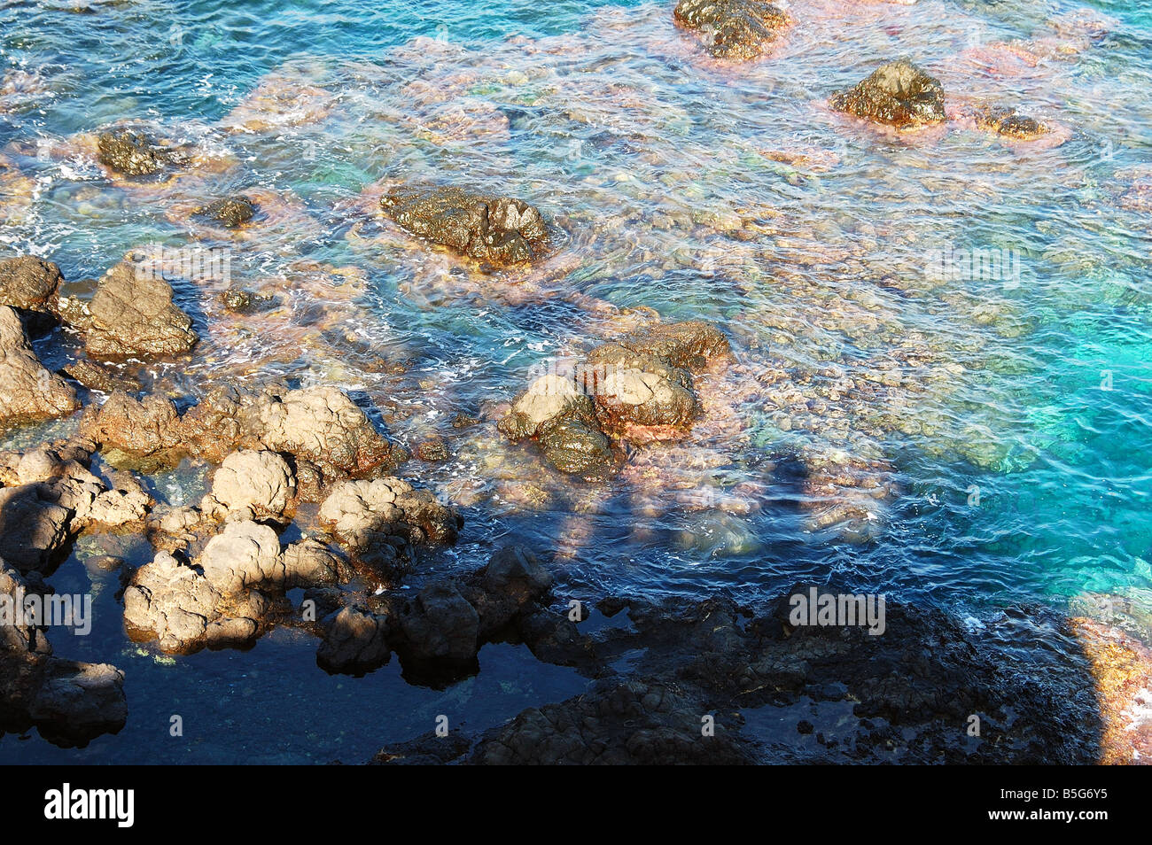 Waves and rocks Stock Photo - Alamy