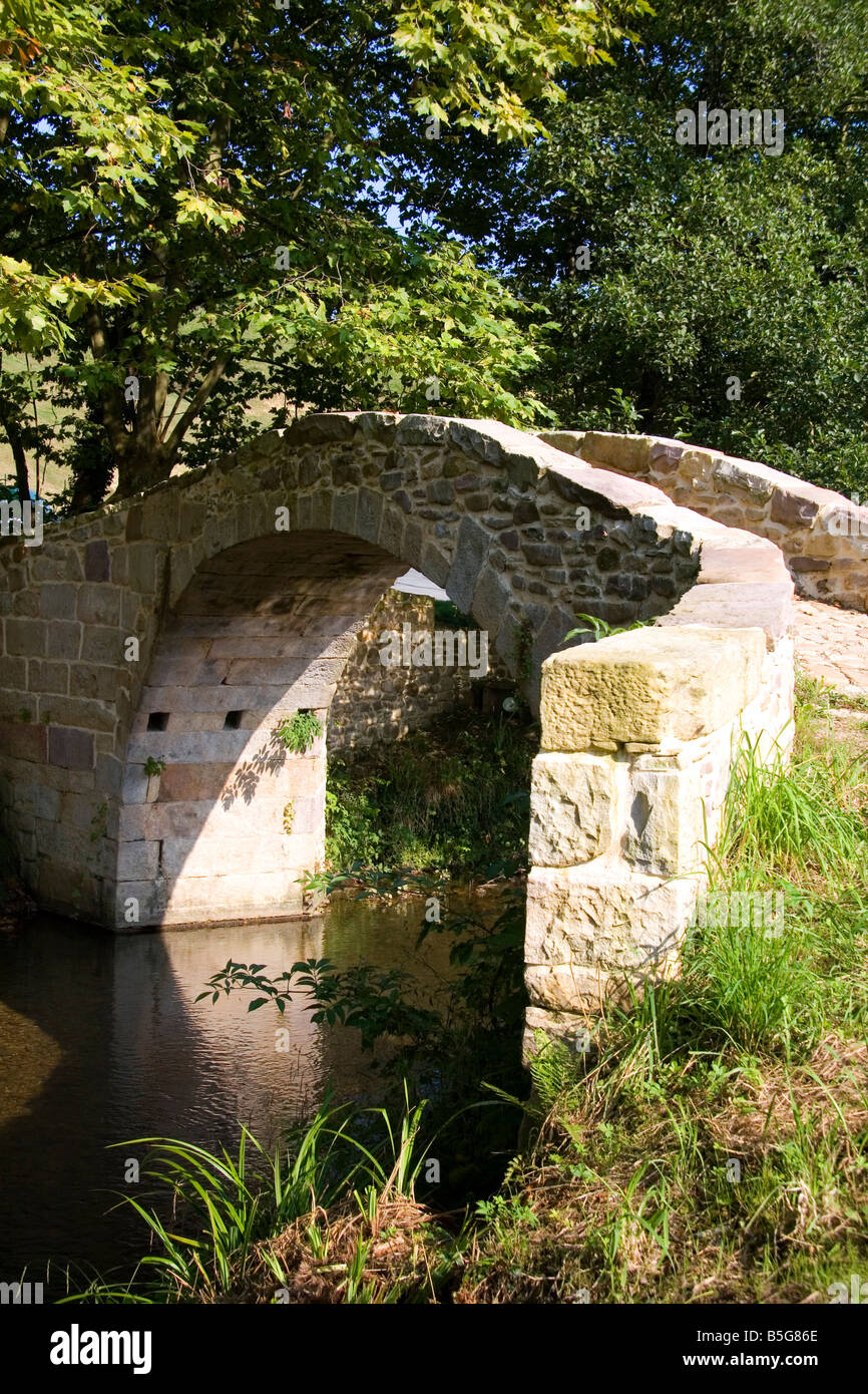Stone footbridge near the village of Sare Pyrenees Atlantiques French Basque Country Southwest France Stock Photo