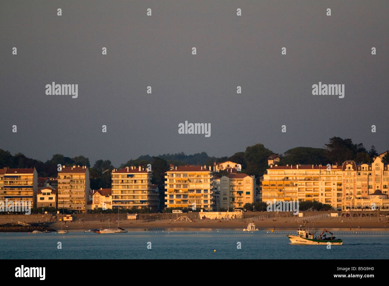 Condominiums at sunset in the commune of Saint Jean de Luz Pyrenees Atlantiques French Basque Country Southwest France Stock Photo