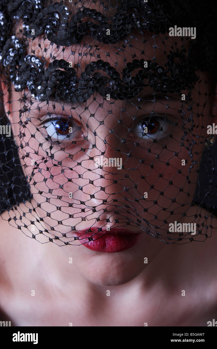 Woman wearing black veil hi-res stock photography and images - Alamy