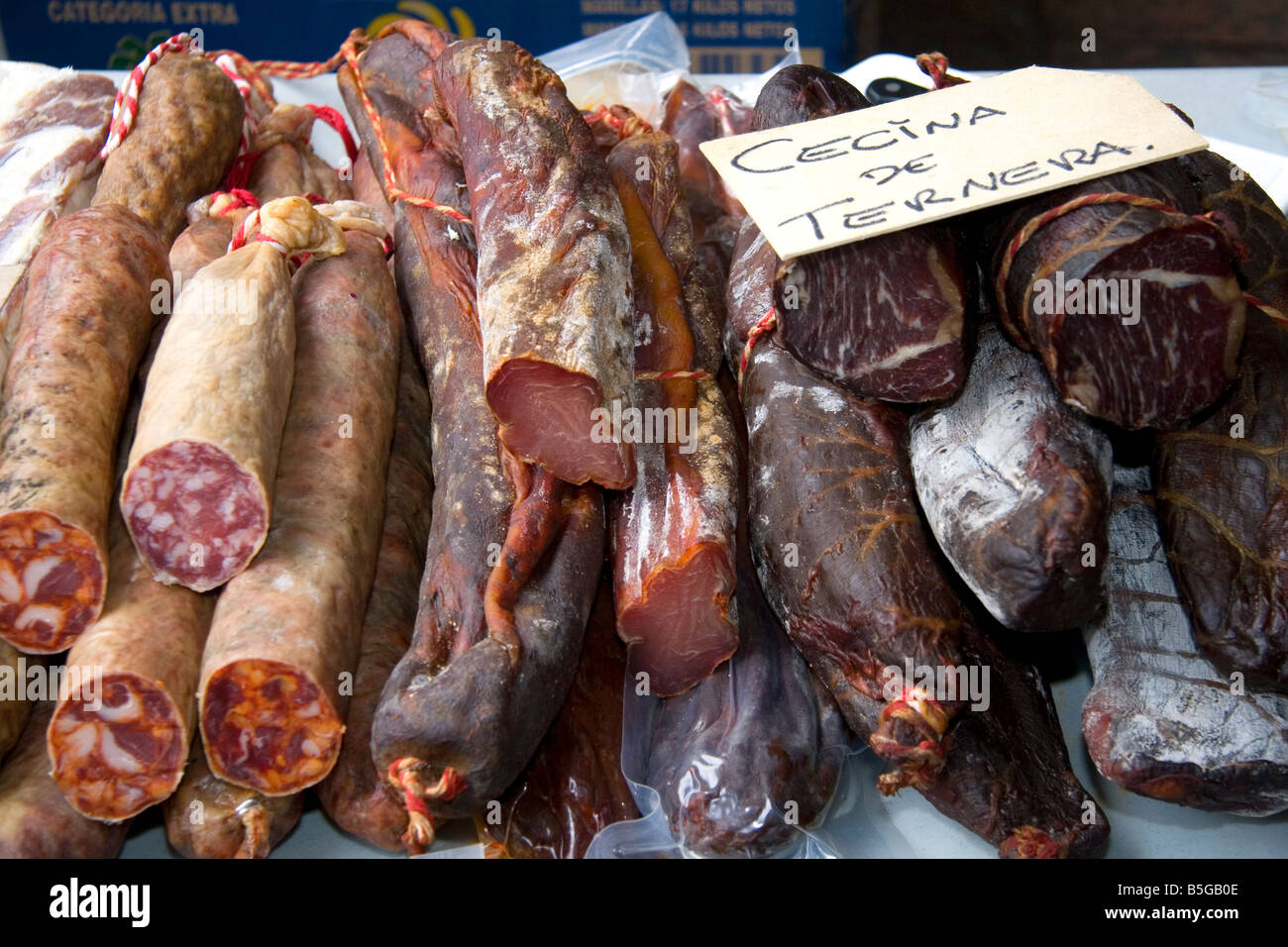 Sausage and cured meat being sold at an outdoor market in the town of Cangas de Onis Asturias northern Spain Stock Photo