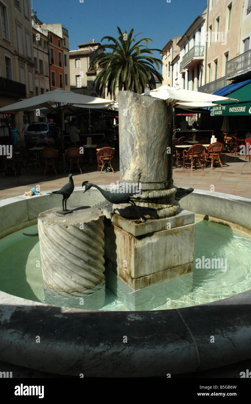 STREET SCENC WITH FOUNTAIN IN FRANCE Stock Photo