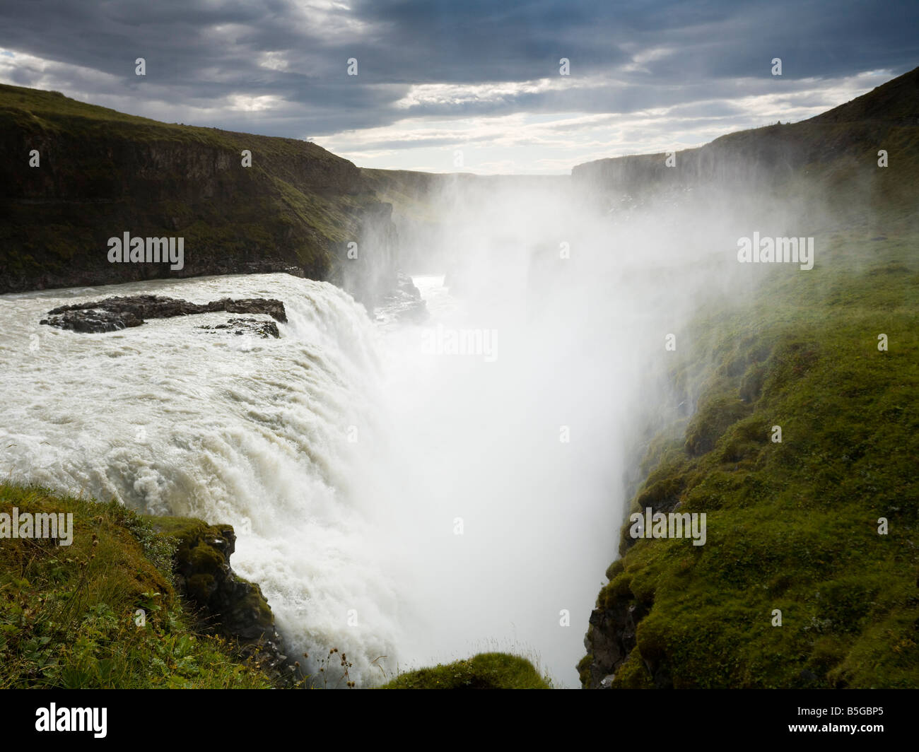 River Hvíta tumbling over the cliff producing the thunderous Gullfoss in Iceland Stock Photo