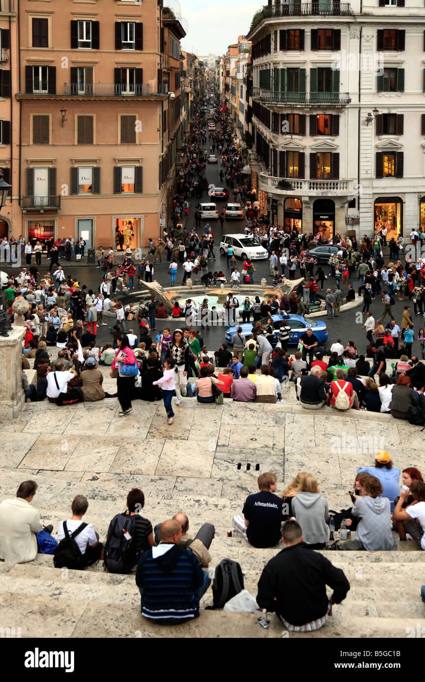 View down the Spanish Steps to the Fontana della Barcaccia and the Via Condotti Piazza di Spagna Rome Italy Stock Photo