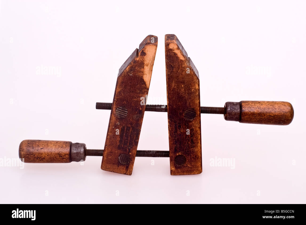 Old fashioned wooden hand screw clamp Stock Photo Alamy