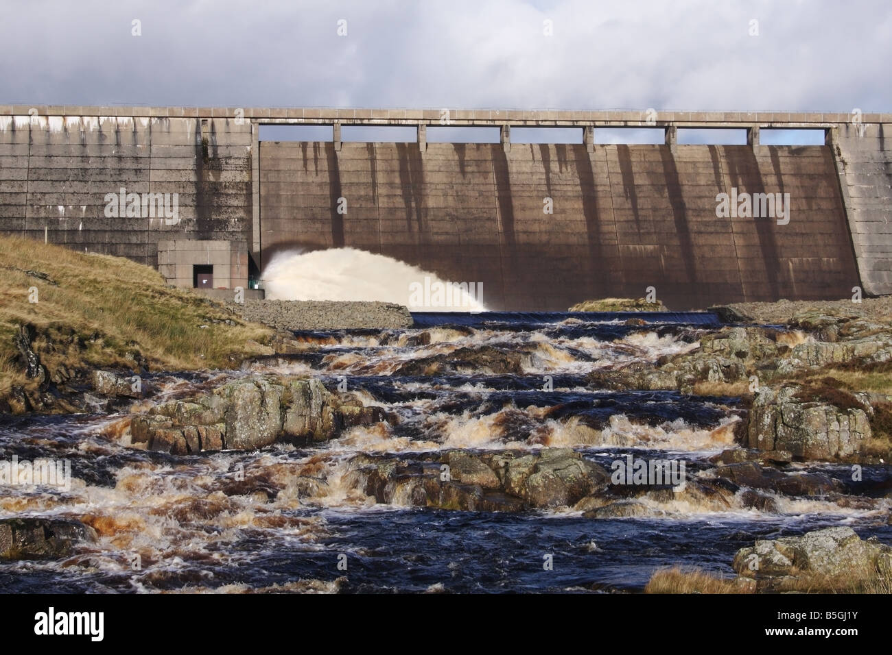 Cow Green Reservoir Discharging Water into the River Tees Upper Teesdale County Durham Stock Photo