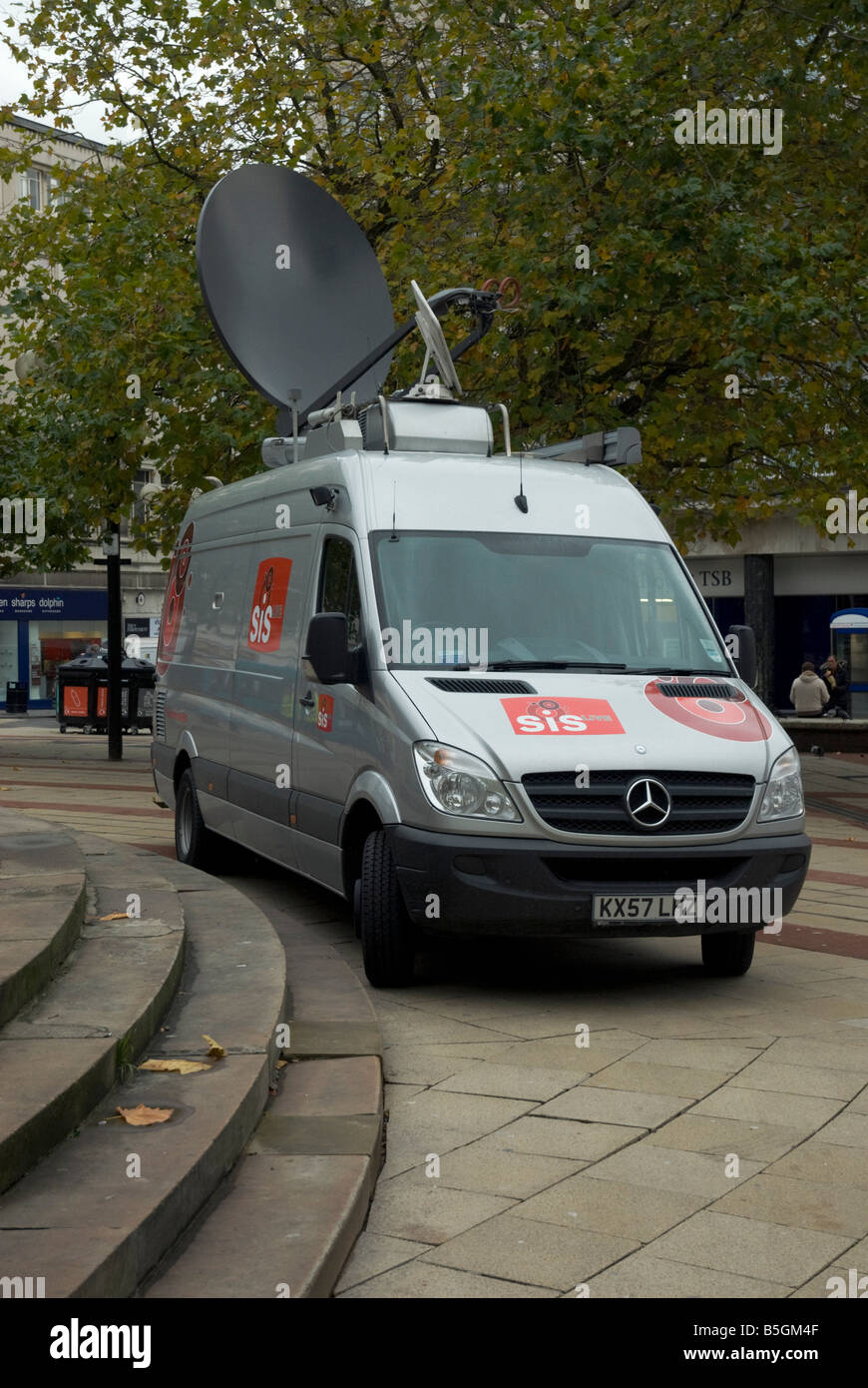 SIS outside broadcast van with satellite dish up Stock Photo