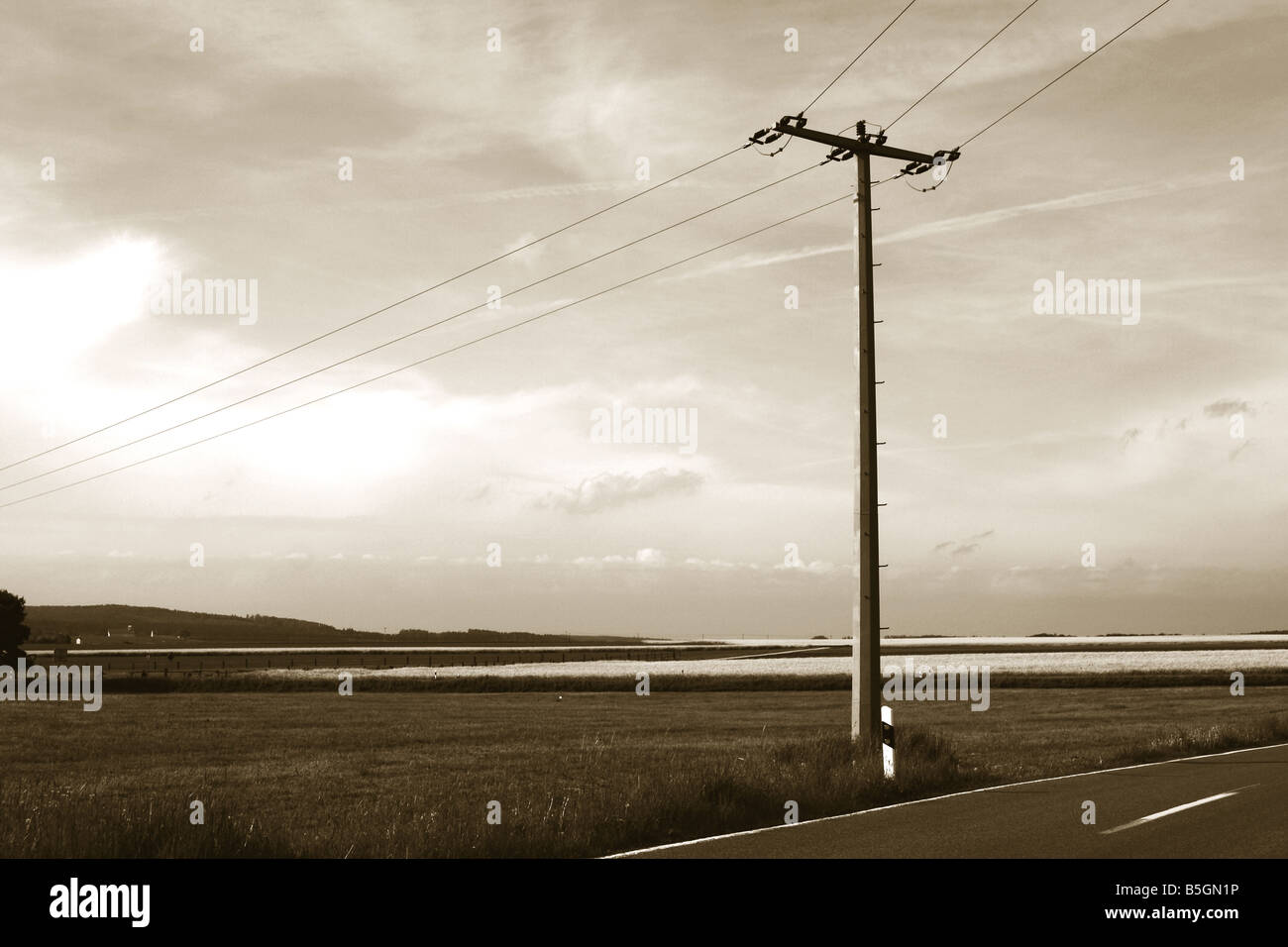 electricity pole in rural field Stock Photo - Alamy