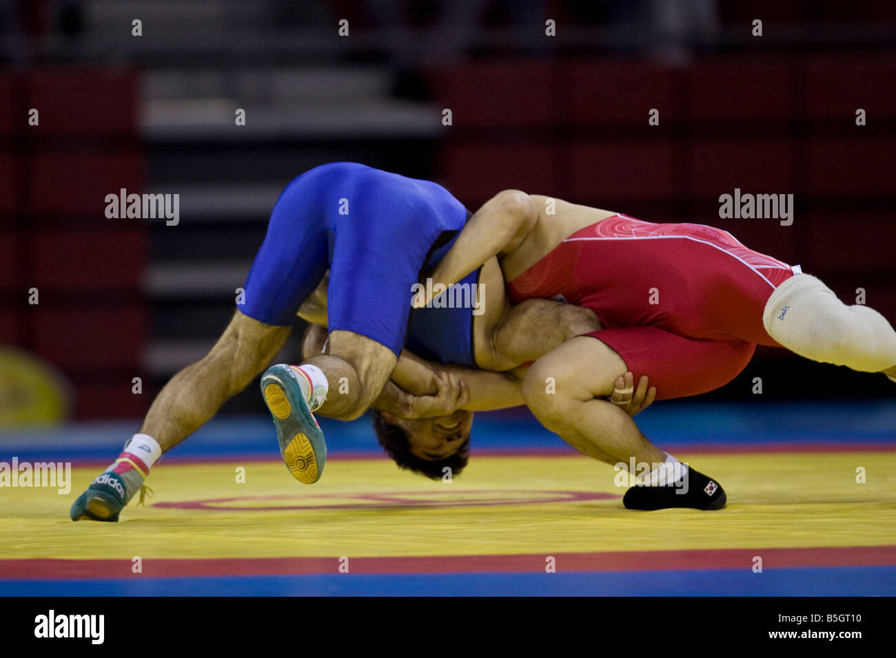 Dae Jong Kim KOR L competing against Muzad Ramazanov MKD in the 60kg freestyle wrestling 1 8 final event at the 2008 Olympic Sum Stock Photo