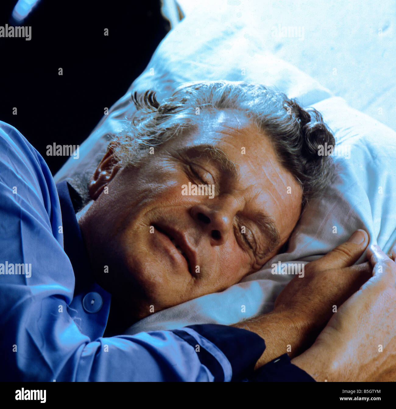 Old man sleep bed hi-res stock photography and images - Alamy