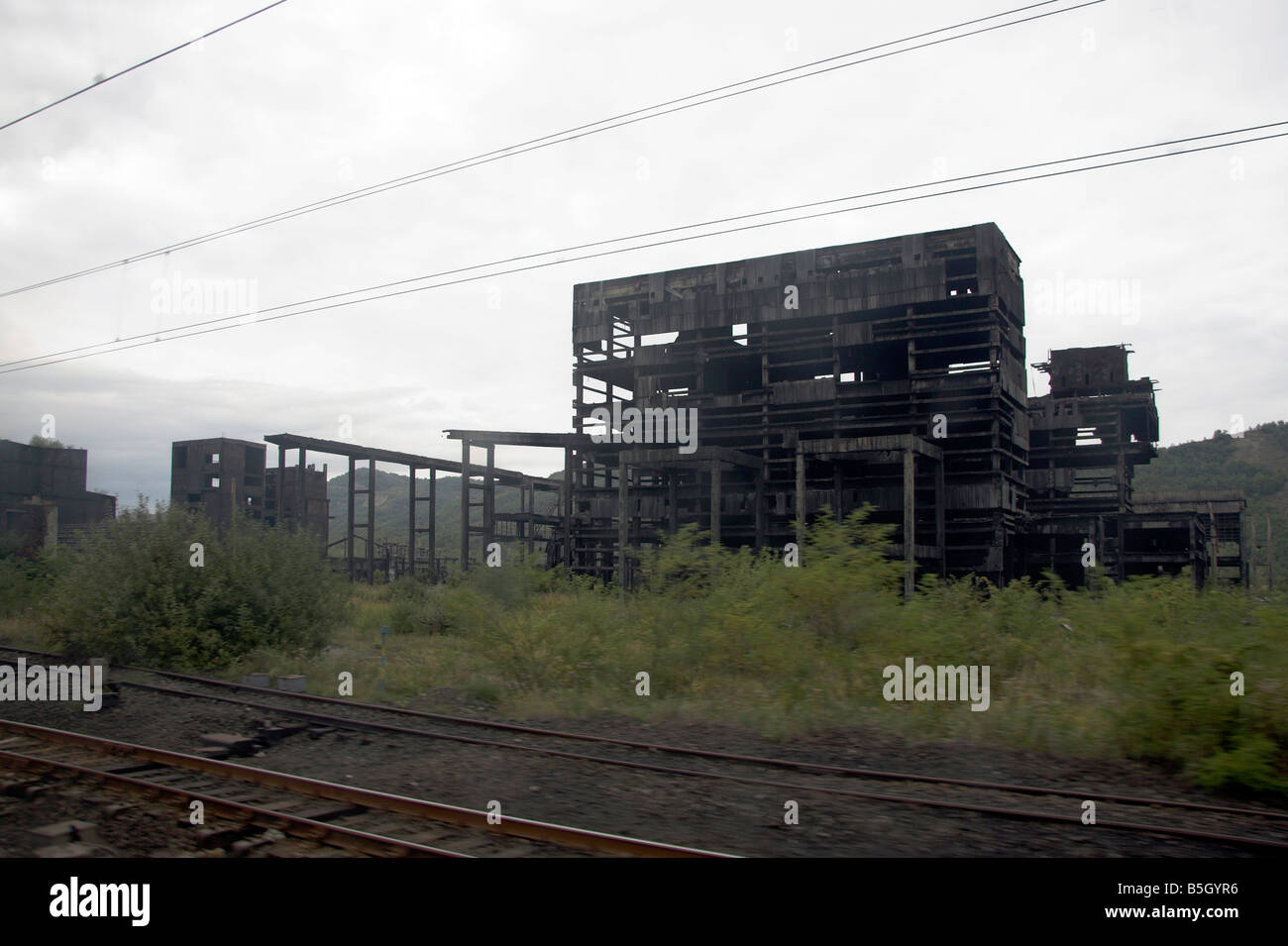 Derelict factory, Sometra, Carbosin, Copsa Mica, Transylvania, Romania Stock Photo