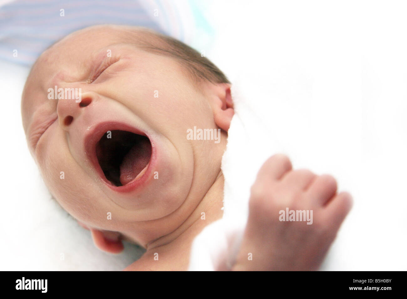 Crying baby on his first day Stock Photo