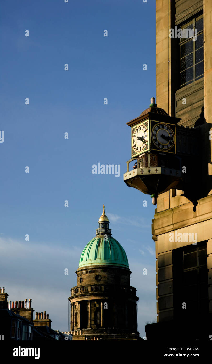 Clock of Fraser's shopping store with copper dome of West Register House, Charlotte Square, west end, Edinburgh, Scotland, UK, Stock Photo