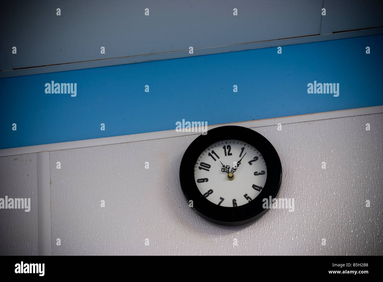 Clock on a factory wall LOCATION RELEASED Stock Photo Alamy