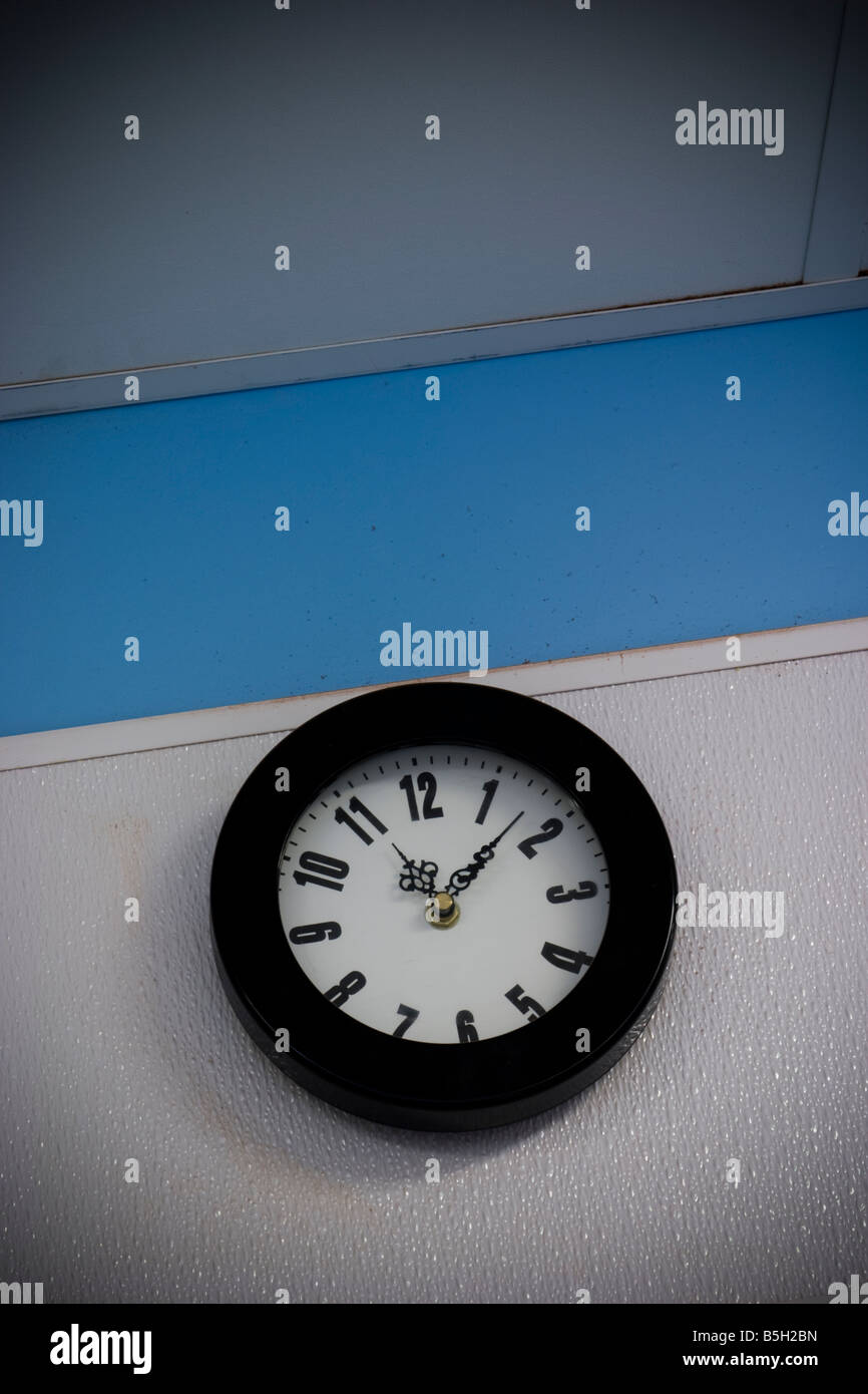 Clock on a factory wall LOCATION RELEASED Stock Photo Alamy