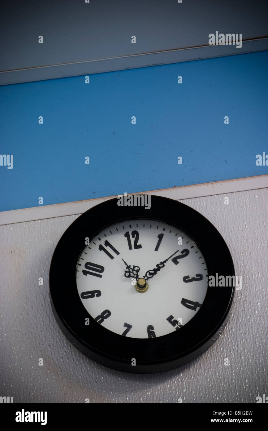 Clock on a factory wall LOCATION RELEASED Stock Photo Alamy