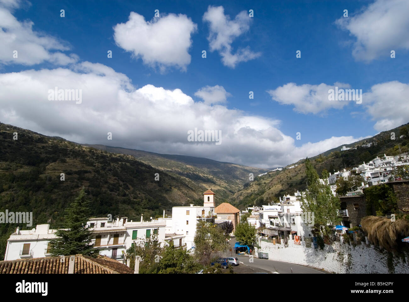 Typical whitewashed Andalucian village Pampaneira in Sierra Nevada Southern Spain Stock Photo