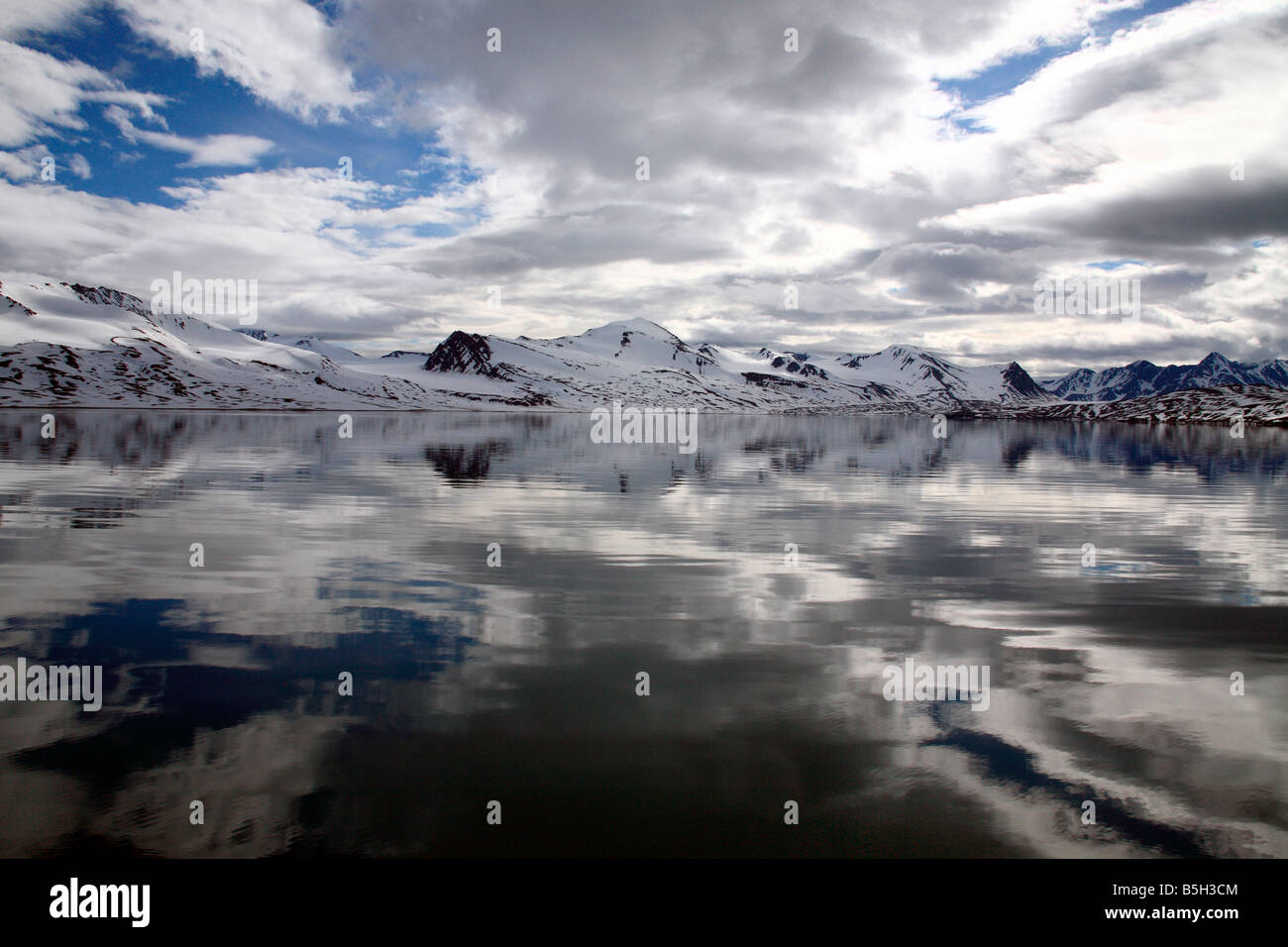 Spitsbergen Snowy Mountains Glacier Reflections Stock Photo