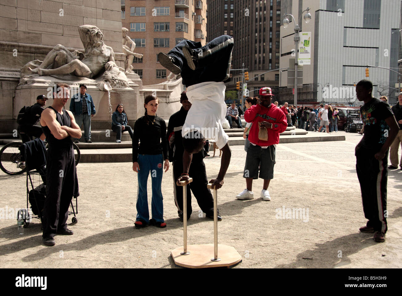 A street performer doing gymnastics in Central Park,New York Stock