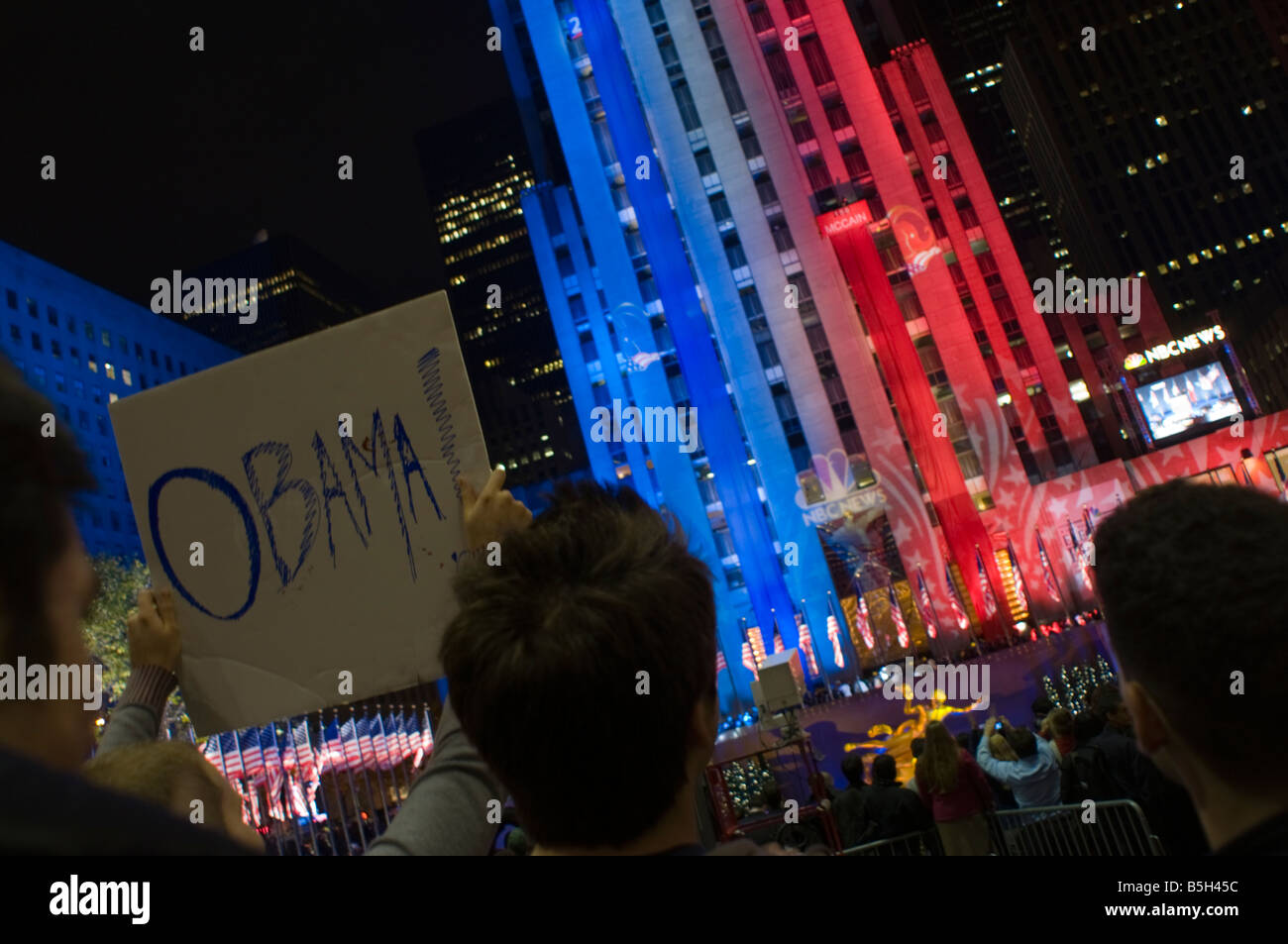 Obama supporters gather in Rockefeller Center to watch election results Stock Photo