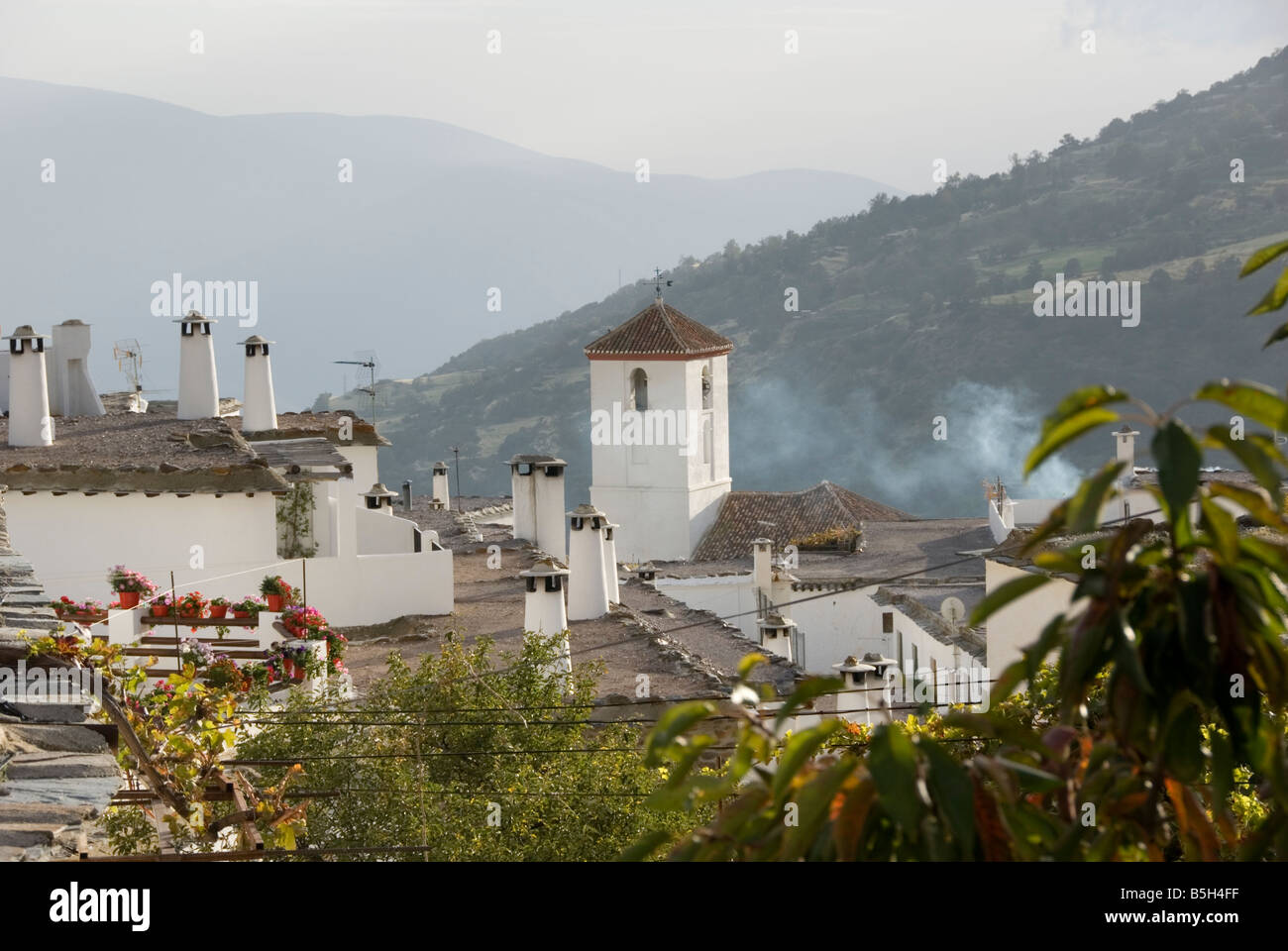 View over the whitewashed Andelucian village of Capileira in the Sierra Nevada in southern Spain Stock Photo