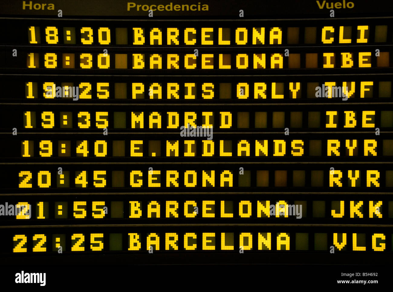 Flight departure information board Spain Stock Photo