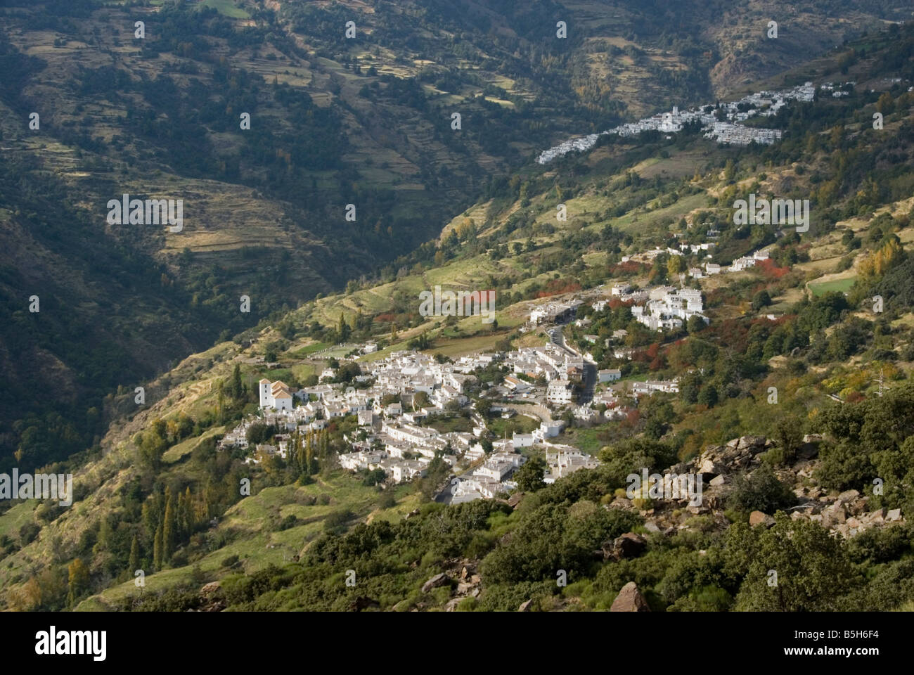 Whitewashed Andalusian villages of Bubion bottom and Capileira in the Sierra Nevada mountain range Alpujarra Spain Stock Photo