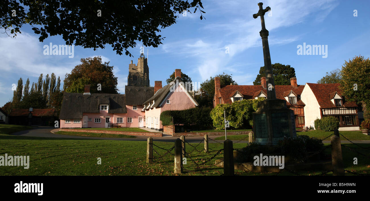 The village green of Cavendish in Suffolk showing pink thatched