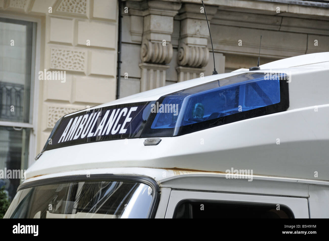 Close up of ambulance with blue light Harley Street London England UK Stock Photo