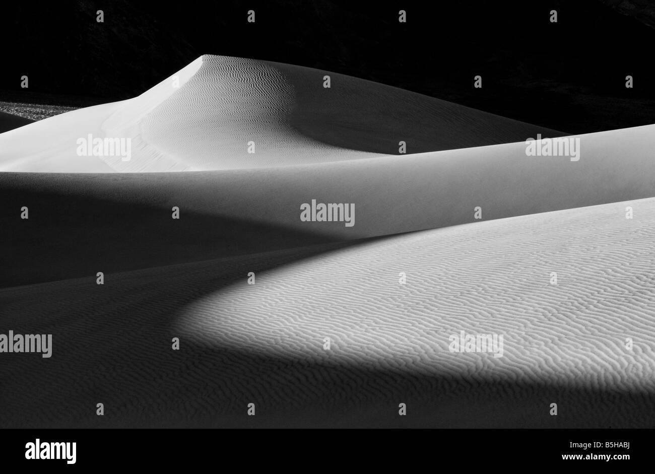 Black and white sand dunes at sunrise Stock Photo Alamy